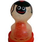Transluzente gelartige spinnfiguren-kondome mit schwarzem gesicht, großen weißen augen und rotem lächeln von condomerie