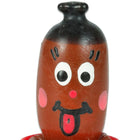 Braune handbemalte kondomsackfigur in flaschenform mit schwarzem deckel und bemalten gesichtszügen von condenserie