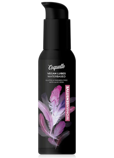Schwarzer coquette veganer wasserbasierten gleitmittel flasche mit elegantem pumpspender und lebhaftem lila federmotiv