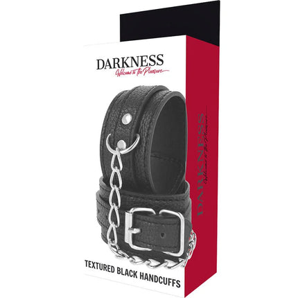 Schwarze handschellen aus strukturiertem leder mit silberner metallkette und schnalle im modell darkness