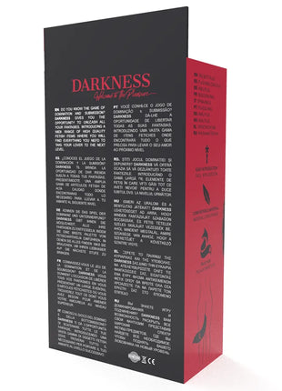 Schwarzer und roter spielkarton von darkness welcome to the pleasure mit mehrsprachigem text auf der rückseite