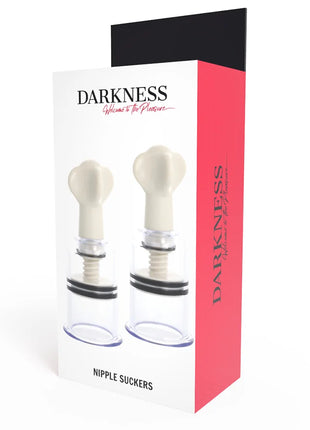 Weiße und schwarze nipplersauger mit 3,1 cm durchmesser in roter und weißer box mit aufdruck darkness