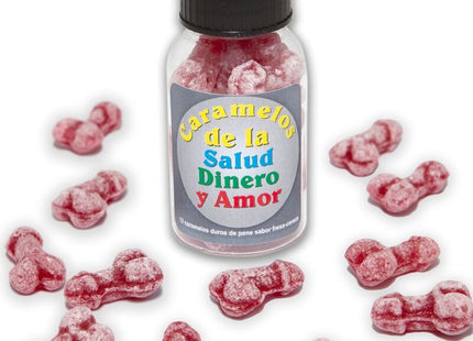 Eine klare glasflasche mit schwarzem deckel enthält rote knochenförmige karamellbonbons zuckerpudrig diablo picante bonbons