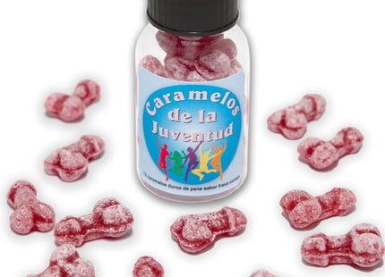Eine klare plastikflasche mit schwarzem deckel enthält rosa, knochenförmige zuckerüberzogene bonbons namens caramelos de la juventud im produkt diabolo picante erdbeere/kirsche