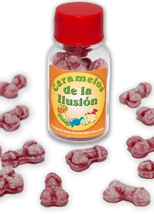 Eine klare glasflasche mit rotem verschluss und orangem etikett caramelos de la ilusión gefüllt mit rosa penisförmigen bonbons diablo picante erdbeere kirsche