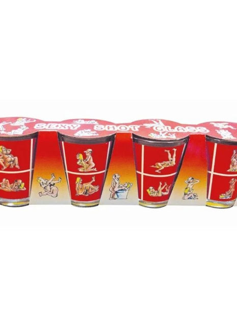 Rote shotgläser aus klarem glas mit schwarzen rändern und bunten kamasutra-cartoonmotiven im diablo picante set