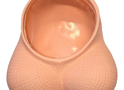 Peachfarbener silikon novelty planter in form eines pausbäckigen eierleerbeutels mit strukturierter oberfläche