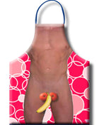 Eine lebhafte pinke herren-fruchtschürze mit kräftigem kreismuster und lustiger grafik eines muskulösen torsos mit obst