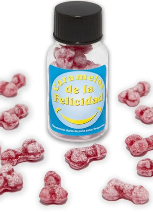 Ein klares glas mit schwarzem deckel enthält rosa bonbons in knochenform und trägt das etikett caramelos de la felicidad