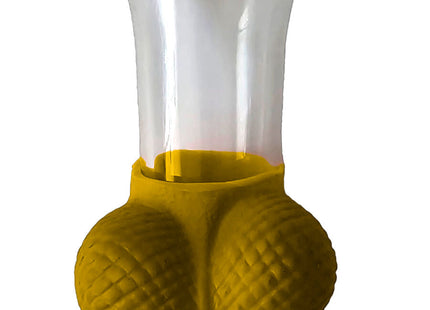 Goldenes schnapsglas diabolo picante mit klarem glas und gelber silikonbasis mit strukturierter oberfläche