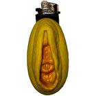 Gelber silikon bananen leichter mit metall top und schwarzen akzenten im produkt diablo picante goldfarbige leichtere vagina