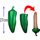 Grüner plastik-pfefferförmiger spielzeug mit einem beige farbigen inneneinsatz diablo picante product