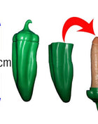 Grüner plastik-pfefferförmiger spielzeug mit einem beige farbigen inneneinsatz diablo picante product