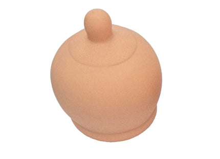 Beige silikon-nippelschild diablo picante mit abgerundeter kuppelform und kleinem knopf oben in brustform