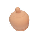 Beige silikon-nippelschild diablo picante mit abgerundeter kuppelform und kleinem knopf oben in brustform