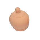 Beige silikon-nippelschild diablo picante mit abgerundeter kuppelform und kleinem knopf oben in brustform