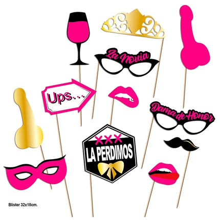 Ein set aus pinken und goldenen fotobox-requisiten mit spaßigen accessoires für die diabolo picante photocall party