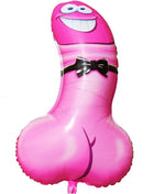 Ein rosa partyballon in penisform mit einem lächelnden gesicht, blauen augen und schwarzer schleife aus pvc