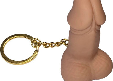 Tanfarbener silikon schlüsselanhänger in penisform mit goldfarbenem metallring und kette diablo picante fleisch