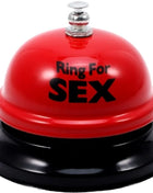 Rote und schwarze schreibtischglocke mit silberner oberseite und ring for sex schriftzug diabolo picante