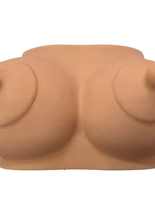 Beiges silikon brustförmiges sparschwein namens diablo picante hellton für massagezwecke