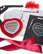 Rotes herzförmiges diablo picante spiel mit glänzender oberfläche und weißer beschriftung corazon seductor