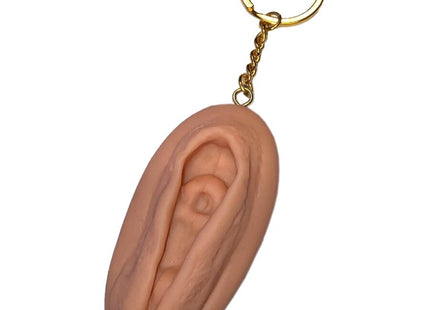 Peachfarbener silikon vagina-schlüsselanhänger diablo picante mit goldfarbenem ring und kette in hellton
