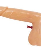 Beige kunststoff wasserpistole in form einer pfeife mit rotem abzug diablo picante design