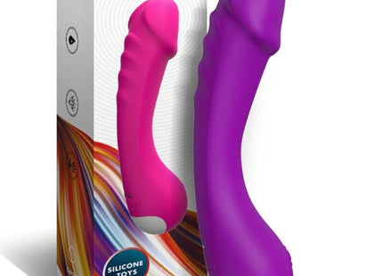 Lila und pinke silikon dildo vibrator mit weißen spitzen neben verpackung für g-punkt stimulation