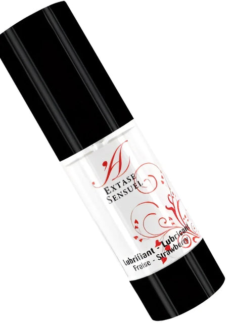 Schwarze und weiße zylindrische flasche mit rotem blumendesign labeled extase sensuel erdbeer duftendes gleitmittel 100 ml