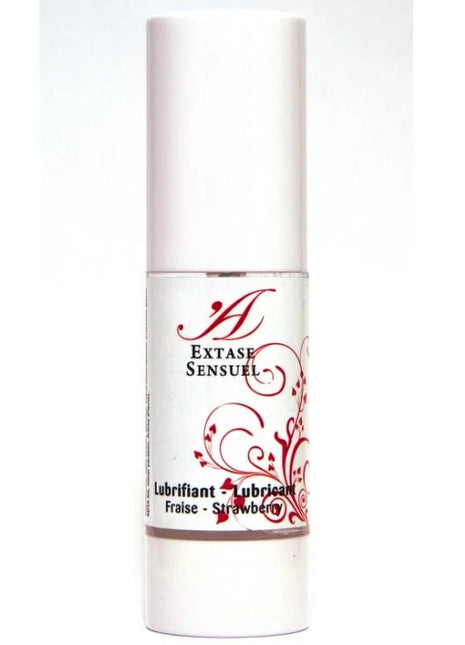 Weiße zylindrische flasche extase sensuel erdbeer schmiermittel mit rotem floralen design und silbernem deckel 30 ml