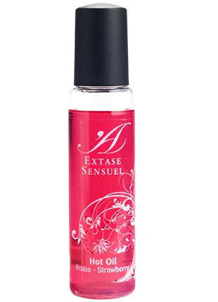 Ein schlanker transparenter glasflasche mit schwarzem verschluss enthält leuchtend rotes öl mit weißem floralem muster