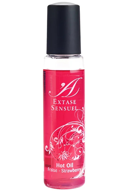 Ein schlanker transparenter glasflasche mit schwarzem verschluss enthält leuchtend rotes öl mit weißem floralem muster