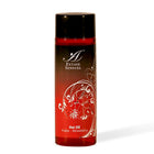 Rote transparente flasche extase sensual wärmestimulierendes öl erdbeer mit schwarzem deckel und weißem floralem muster