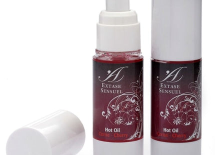 Zwei schlanke zylindrische flaschen extase sensuel kirsch wärme stimulierendes öl mit tiefburgundischem und weißem design