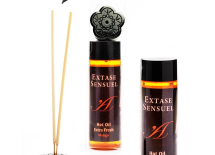 Schwarzer diffuser in blumenform mit mango duftendem heißöl nachfüllung und passenden schilfrohren extase sensual 100 ml