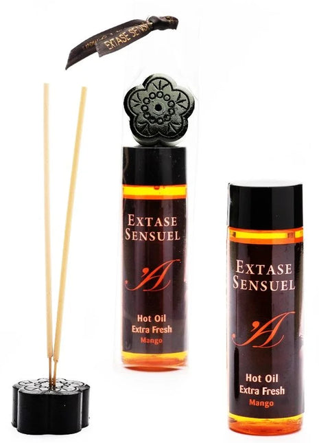 Schwarzer diffuser in blumenform mit mango duftendem heißöl nachfüllung und passenden schilfrohren extase sensual 100 ml