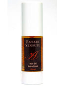 Ein elegantes weißes zylindrisches 30 ml fläschchen extase sensuel mango stimulierendes öl mit dunkelgoldenem etikett