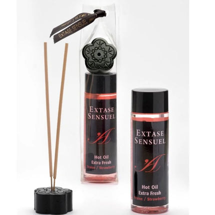 Schwarzer blumenförmiger diffuser mit rosewood sticks und extase sensuel massageöl mit erdbeereffekt 100 ml