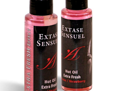 Zwei transparente plastikflaschen mit schwarzen verschlüssen und etiketten, pinkes massageöl extase sensuel hot oil erdbeerduft 100 ml