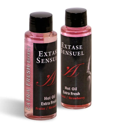Zwei transparente plastikflaschen mit schwarzen verschlüssen und etiketten, pinkes massageöl extase sensuel hot oil erdbeerduft 100 ml