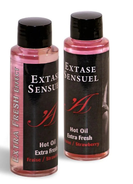 Zwei transparente plastikflaschen mit schwarzen verschlüssen und etiketten, pinkes massageöl extase sensuel hot oil erdbeerduft 100 ml