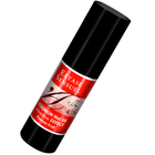 Schwarze zylindrische flasche mit rotem etikett extase sensuel massageöl mit wärmeeffekt und passionsfrucht pheromonen 30 ml