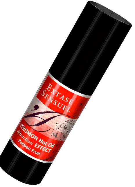 Schwarze zylindrische flasche mit rotem etikett extase sensuel massageöl mit wärmeeffekt und passionsfrucht pheromonen 30 ml