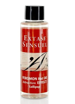 Eine klare flasche mit schwarzem deckel enthält rote etikettierte extase sensuel massageöl mit wärmeeffekt und pirulet pheromonen