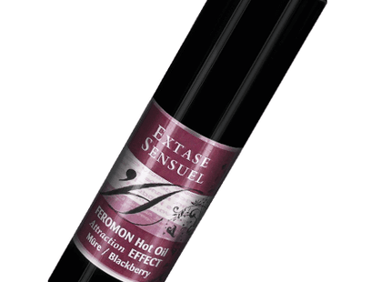 Schwarze zylindrische flasche extase sensual massageöl mit wärmeeffekt und brombeer pheromonen 30 ml mit lila etikett