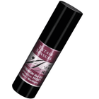 Schwarze zylindrische flasche extase sensual massageöl mit wärmeeffekt und brombeer pheromonen 30 ml mit lila etikett