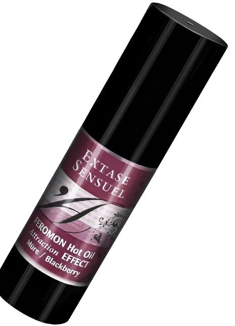 Schwarze zylindrische flasche extase sensual massageöl mit wärmeeffekt und brombeer pheromonen 30 ml mit lila etikett