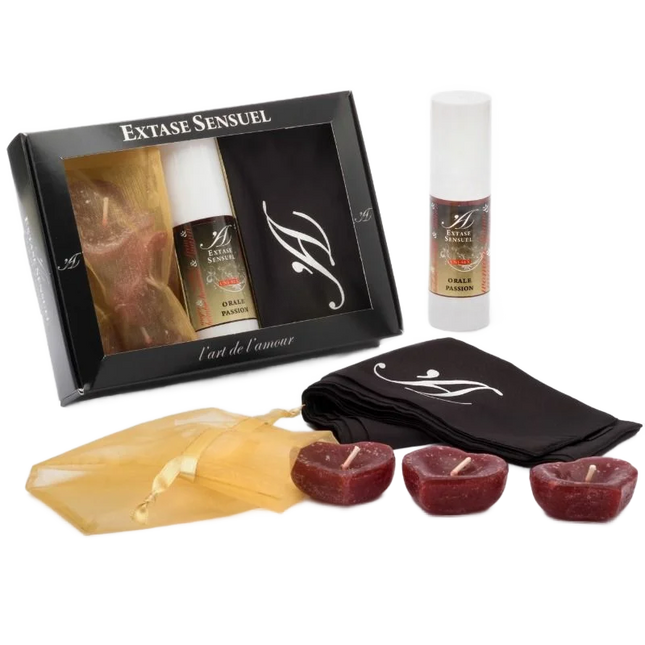 Schwarze geschenkbox extase sensuel mit klarem fenster zeigt flasche tuch und herzförmige kerzen für orale leidenschaft