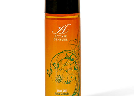 Orange glasflasche mit schwarzem deckel und grünem floralen design extase sensuel piña colada warmes stimulierendes öl 100 ml